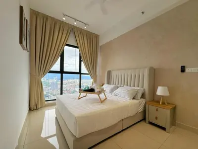 a bedroom with a large bed with a window at 3R3B KLCity CentreView (Balcony) - 8 pax in Kuala Lumpur