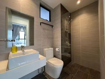 a bathroom with a sink and a toilet and a shower at 3R3B KLCity CentreView (Balcony) - 8 pax in Kuala Lumpur