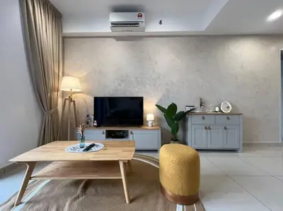 a living room with a table and a tv at 3R3B KLCity CentreView (Balcony) - 8 pax in Kuala Lumpur