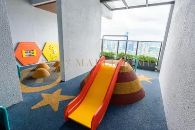 a childrens play area with a slide in a room at Trion Premier Suites Kuala Lumpur in Kuala Lumpur