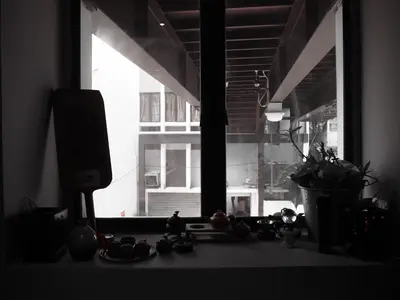 a window in a room with a view of a building at Leo Leisure Hotel @ Central Market in Kuala Lumpur