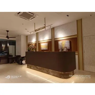 a lobby with a reception desk in a building at Sakura Elite Kuala Lumpur in Kuala Lumpur