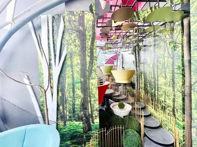 a wall with a mural of a forest at Arte plus by studio sweet home in Batu Empat