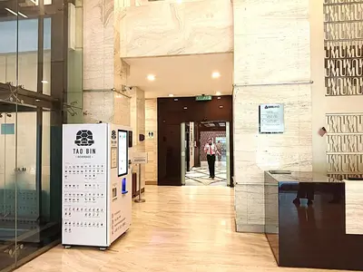 a hallway in a building with a refrigerator in it at Suasana Suites KLCC Bukit Ceylon in Kuala Lumpur
