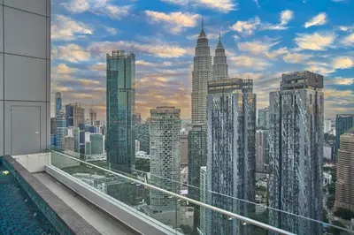 a view of a city skyline with skyscrapers at Royce Residence KLCC by Cobnb in Kuala Lumpur