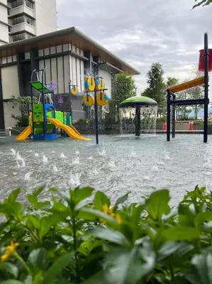 a flooded playground in front of a building at Lavile @ Sunway Velocity Mall in Kuala Lumpur