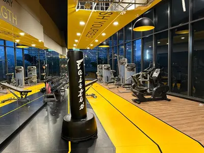 a gym with treadmills and machines in a building at Neu Suites Service Apartment in Kuala Lumpur