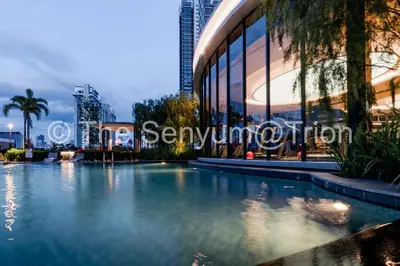 a large swimming pool in front of a building at TRION Studio 4 PAX Teneighth in Kuala Lumpur