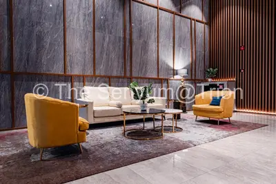 a living room with a couch and two chairs and a table at TRION Studio 4 PAX Teneighth in Kuala Lumpur