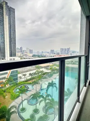 a view from the balcony of a building with a pool at 2R2B*1-6+1 Pax*KL City*10mins-KLCC in Kuala Lumpur