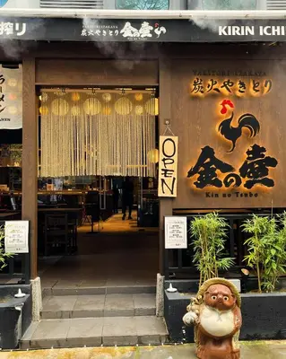 a store front with a monkey statue in front of it at The Mesui Hotel Bukit Bintang in Kuala Lumpur