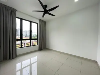 an empty living room with a ceiling fan at Trion KL in Kuala Lumpur