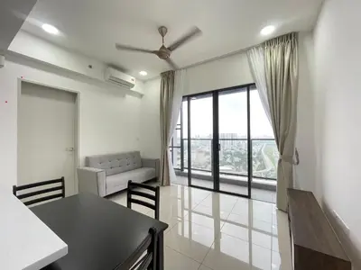 a living room with a table and a large window at Trion KL in Kuala Lumpur
