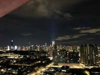 a view of a city at night at FHS Homestay @ Arte Plus Jalan Ampang T3-33A-07 in Kuala Lumpur