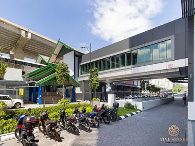 a row of motorcycles parked in front of a building at Datum Jelatek Residence, KLCC in Kuala Lumpur