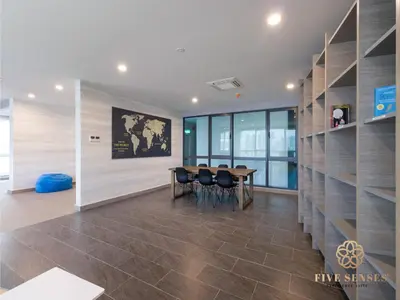a meeting room with a table and chairs in a building at Datum Jelatek Residence, KLCC in Kuala Lumpur