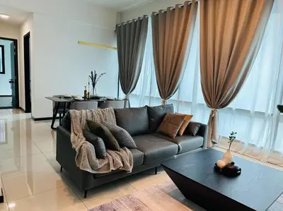 a living room with a couch and a table at Opus Residence KL 118 Chinatown by \u54c1\u5c4b PINWU Shortstay in Kuala Lumpur