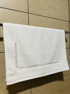 a white napkin on a towel rack in a bathroom at Opus Residence KL 118 Chinatown by \u54c1\u5c4b PINWU Shortstay in Kuala Lumpur