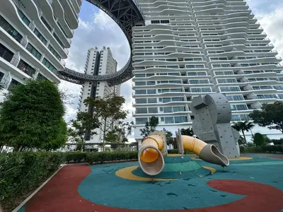 a park in front of some tall buildings at Datum Jelatek Sky Resident KLCC by Deen in Kuala Lumpur