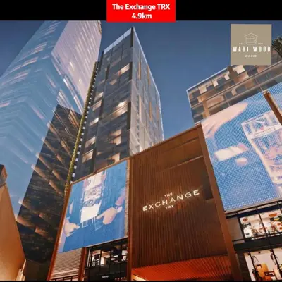 a view of a tall building in a city at Chambers Suites KL by Wabi Wood's House in Kuala Lumpur