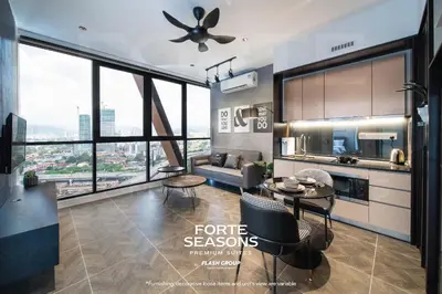 a living room with a couch and a table at Forte Seasons Scarletz Premium Suites @ KLCC in Kuala Lumpur