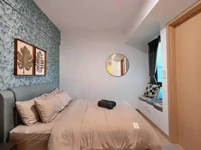 a small bedroom with a bed and a mirror at 2BR, 7PX The Colony@Near Quill CityMall & Monorail in Kuala Lumpur