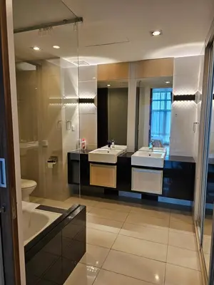 a bathroom with two sinks and a shower at Premier 2BR Suites, Dua Sentral in Kuala Lumpur
