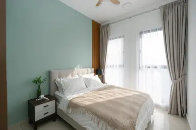 a bedroom with a bed and a window at Trion Kuala Lumpur by Cobnb in Kuala Lumpur