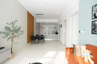a living room with a couch and a table at Trion Kuala Lumpur by Cobnb in Kuala Lumpur