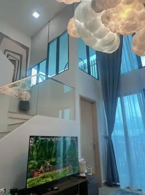 a living room with a tv and a large window at 7PX 2BR Family Gathering Loft @ Colony, Near Quill City Mall & Monorail in Kuala Lumpur