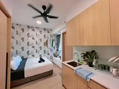 a bedroom with a bed and a ceiling fan at 7PX 2BR Family Gathering Loft @ Colony, Near Quill City Mall & Monorail in Kuala Lumpur