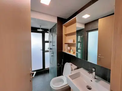 a bathroom with a sink and a toilet and a shower at 7PX 2BR Family Gathering Loft @ Colony, Near Quill City Mall & Monorail in Kuala Lumpur