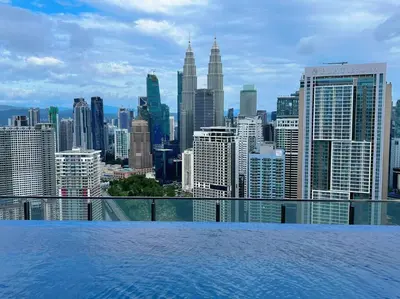 a view of a city skyline from a swimming pool at 4PX Loft @ Colony, Near Quill City Mall & Monorail in Kuala Lumpur