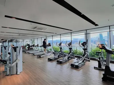 a gym with a bunch of treadmills and machines at 4PX Loft @ Colony, Near Quill City Mall & Monorail in Kuala Lumpur
