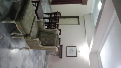 a spiral staircase in a building with a ceiling at Golden City Apartment - Leisure Holiday Resorts in Kuala Lumpur