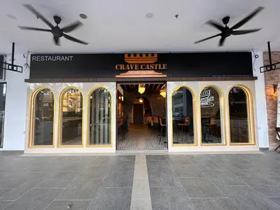 a restaurant with two ceiling fans on top of a building at Trion Kuala Lumpur by Roam in Kuala Lumpur