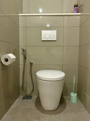 a bathroom with a toilet and a shower at Tribeca Residence Bukit Bintang in Kuala Lumpur