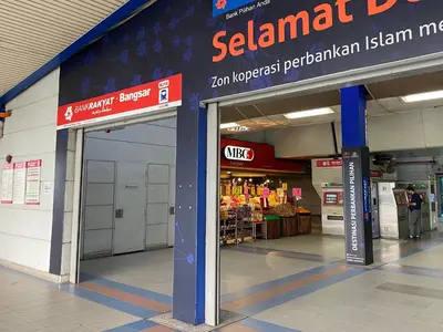 a store entrance to a store in a shopping mall at The Establishment Bangsar KL by Lynhomes in Kuala Lumpur