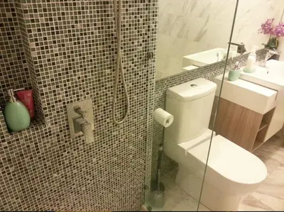 a bathroom with a toilet and a sink and a shower at Studio with an amazing view. 10 min to KLCC in Kuala Lumpur