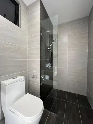 a bathroom with a toilet and a shower at Trion @ KL By Awesomestay in Kuala Lumpur