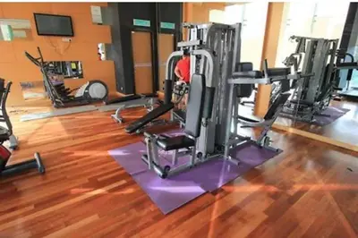 a gym with several tread machines in a room at Sweet Home-0263A-Casa Residency in Kuala Lumpur