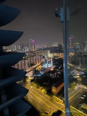 a view of a city at night from a building at Sweet Home-0263A-Casa Residency in Kuala Lumpur