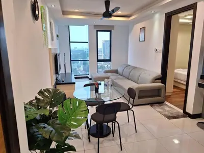 a living room with a couch and a table at 026-3A Sweet Home-Casa Residency 2R 2B in Kuala Lumpur