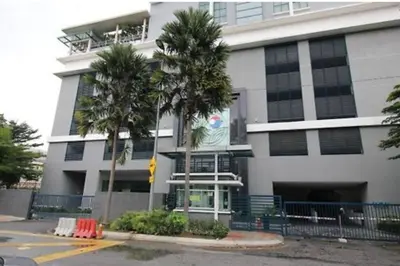 a building with palm trees in front of it at 026-3A Sweet Home-Casa Residency 2R 2B in Kuala Lumpur