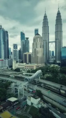a view of a city with buildings and a highway at King Studio Suite Legasi Kampung Bharu view KLCC in Kuala Lumpur