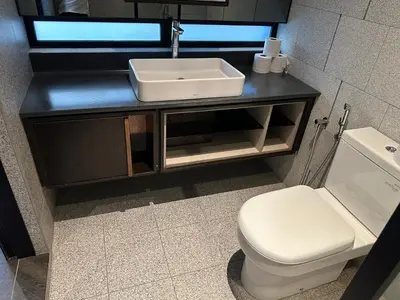 a bathroom with a sink and a toilet at Scarletz Suites KLCC Kuala Lumpur by OKIDOKI Homes in Kuala Lumpur