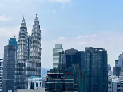 a group of tall buildings in a city at Anggun KL Mal in Kuala Lumpur