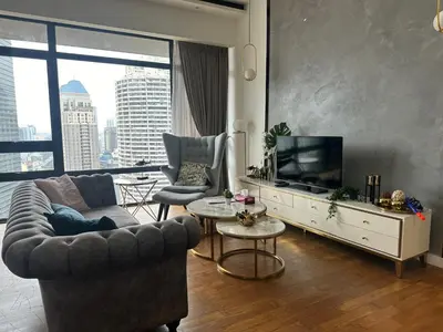 a living room with a couch and a tv at Anggun KL MY in Kuala Lumpur