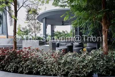 a group of plants in front of a building at TRION Studio 4 PAX Eleventen in Kuala Lumpur