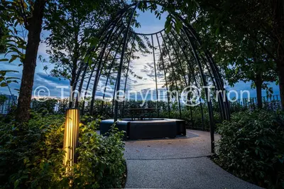 a ride in a park with a bench and a swing at TRION Studio 4 PAX Eleventen in Kuala Lumpur